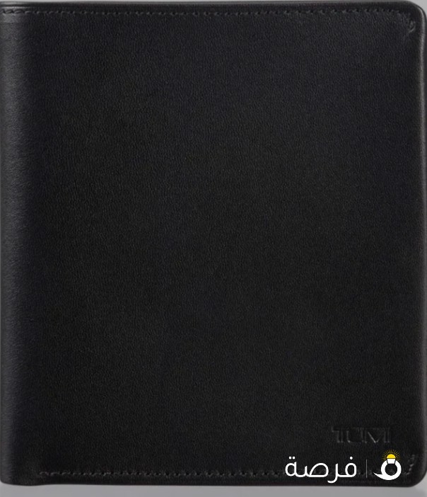 Brand new Tumi leather wallet in box!