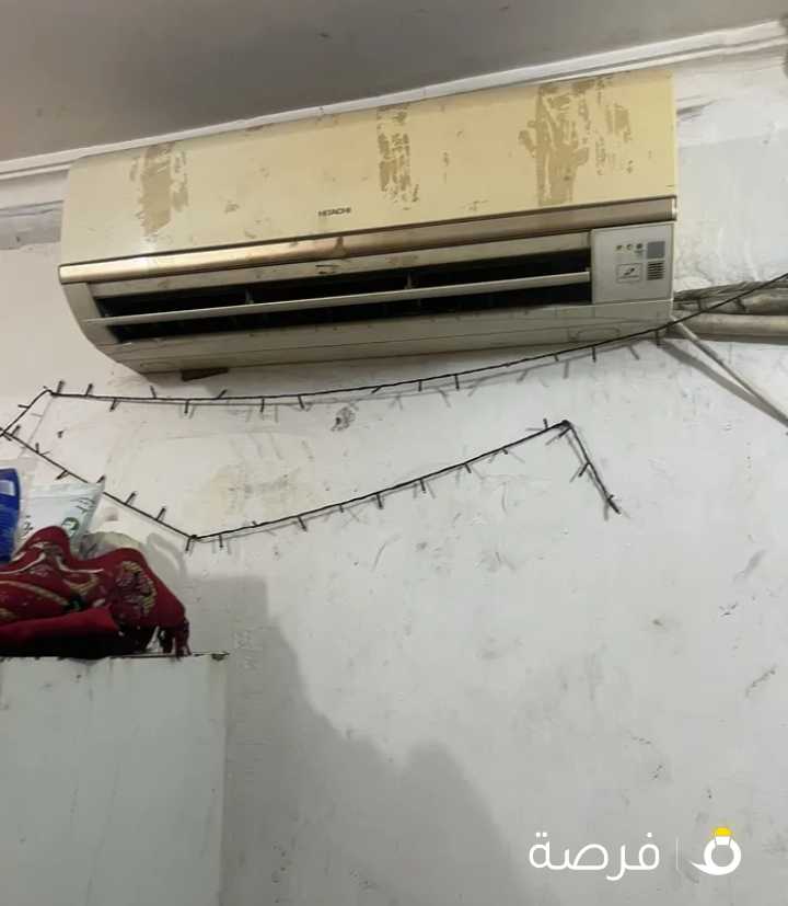 مكيف هيتاشي طن ونصغ