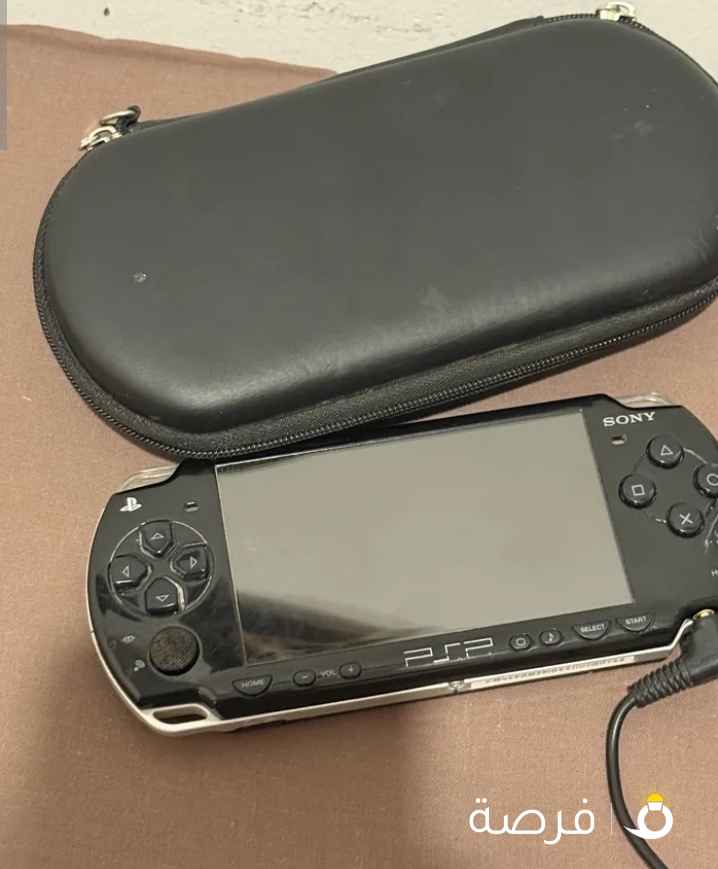 Sony PSP 2000 with case, charger and battery.