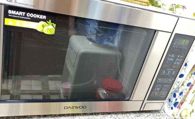 مايكرويف شبه جديد داينو