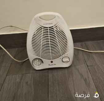 دفاية بالكهرباء مع مروحة للهوية او التدفئة