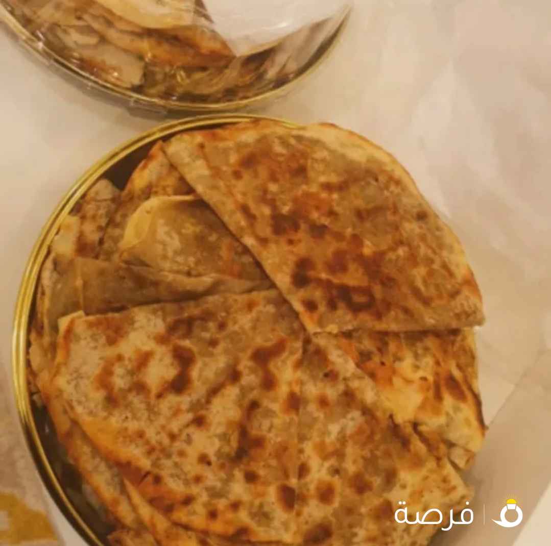 خبز صاج مهياوة بالزبدة او زيت زيتون او دهن عداني مهياوة اجار ثوم يبل مع طماط او بدون طماط كيلو دهن