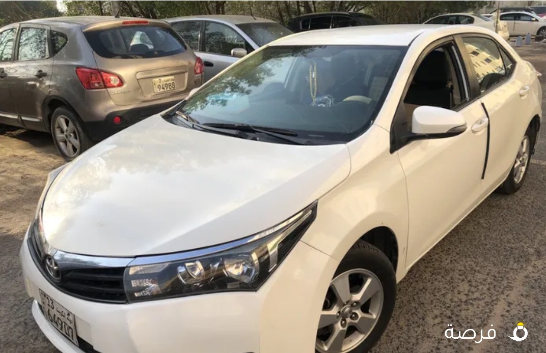 كورولا 2015 ماكينه 1600 cc ابيض صدفى