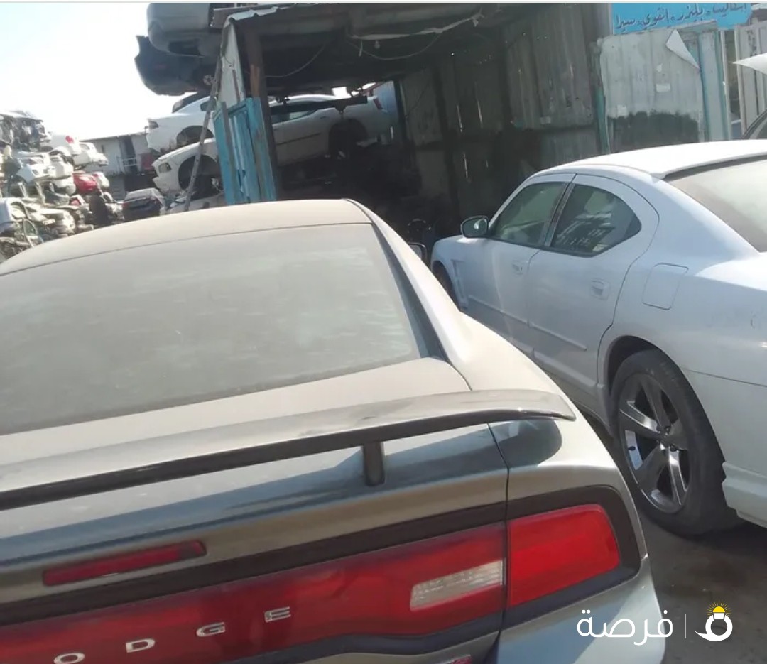 كراج الربيع لخدمة وإصلاح السيارات الدوج خدمه 24