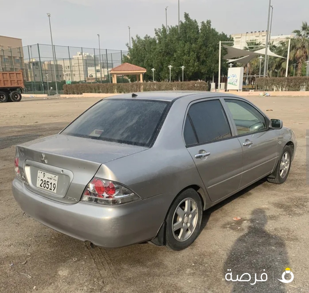 لانسر 2009بحالة الوكالة شرط الفحص اذا فيها شي الفحص ع حسابي مكينه 1,600سي سي