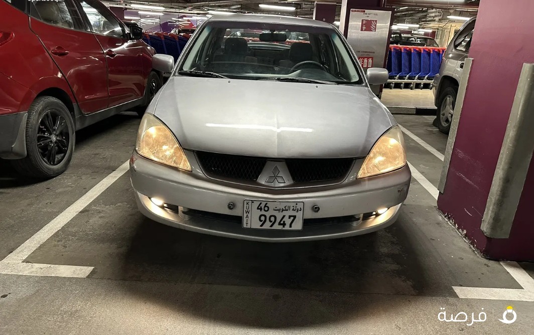 لانسر2009 مكينه1600 Cc