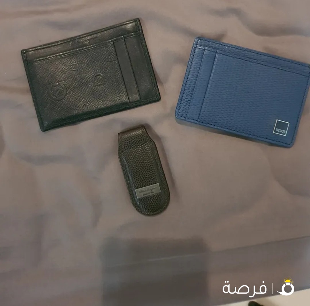 Salvatore Ferragamo wallet and money clip, and Tumi wallet. all original and in great condition.