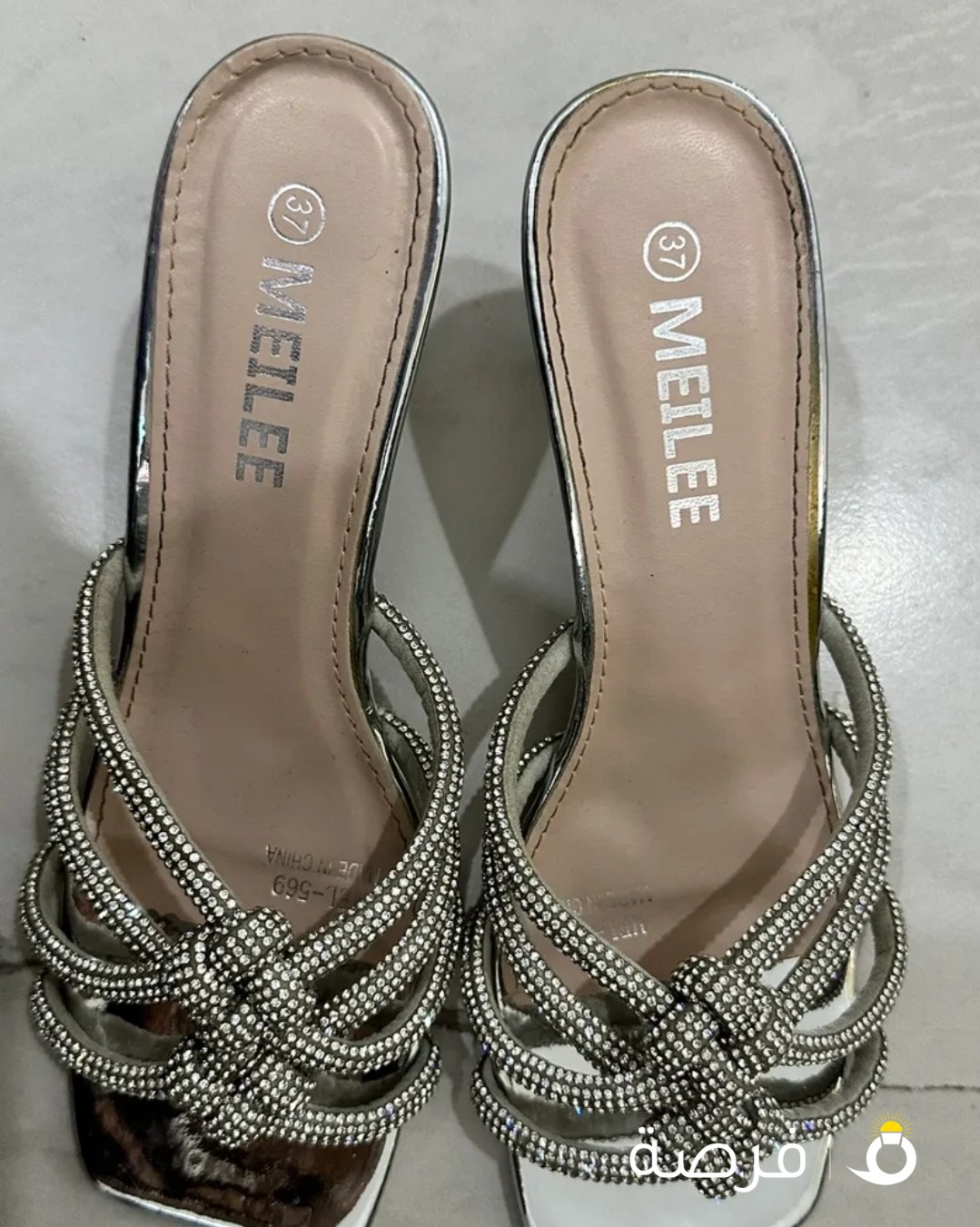 Sparkly silver high heel (not to high)