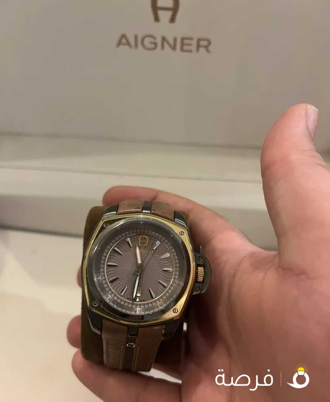 ساعة AIGNER نظيفة