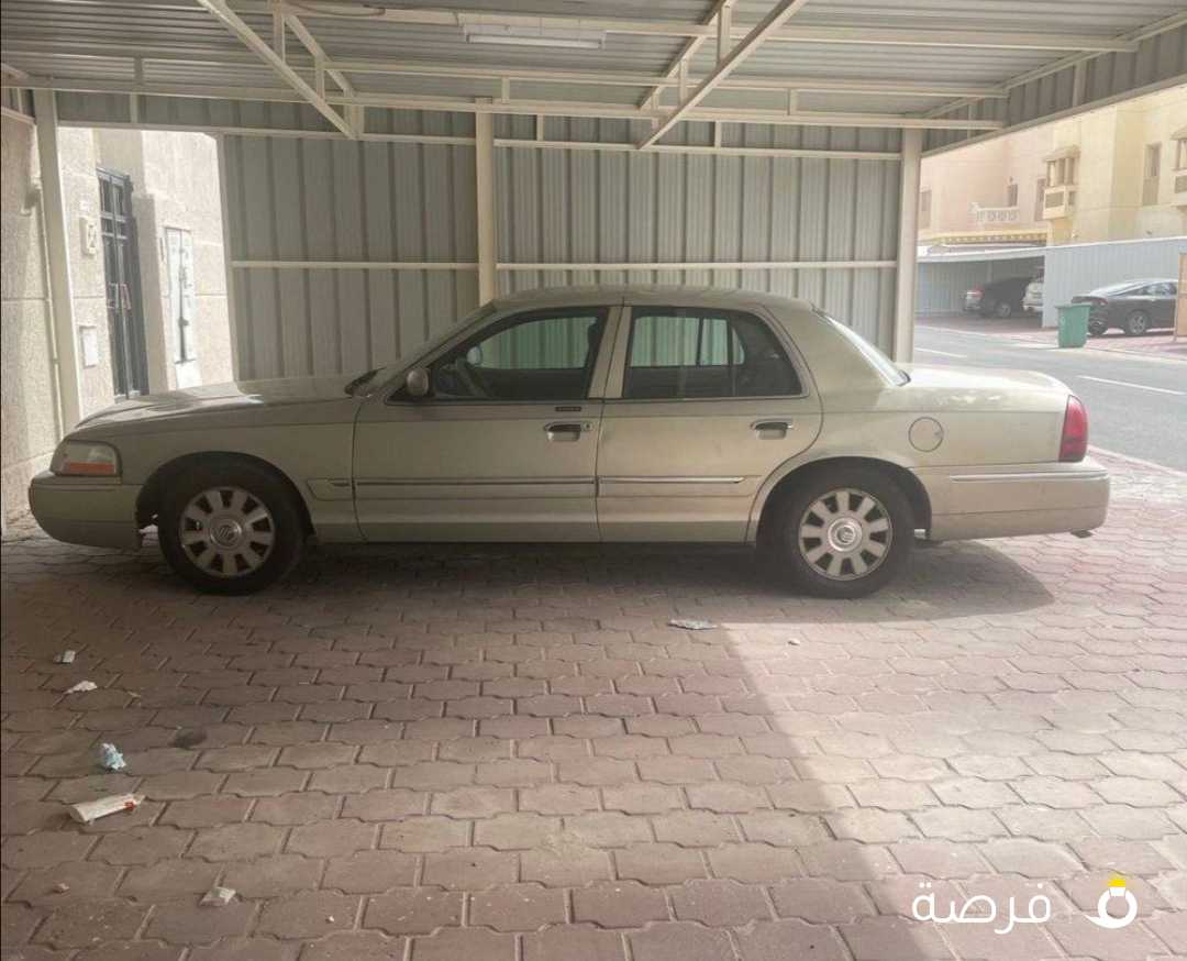 للبيع قراند ماركيز موديل ۲٠۰0 ذهبي علي نفس الرقم