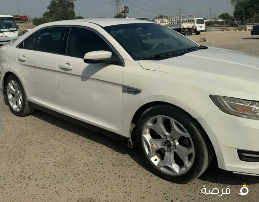 للبيع فورد تورس لون ابيض 2011 بحاله جيدة