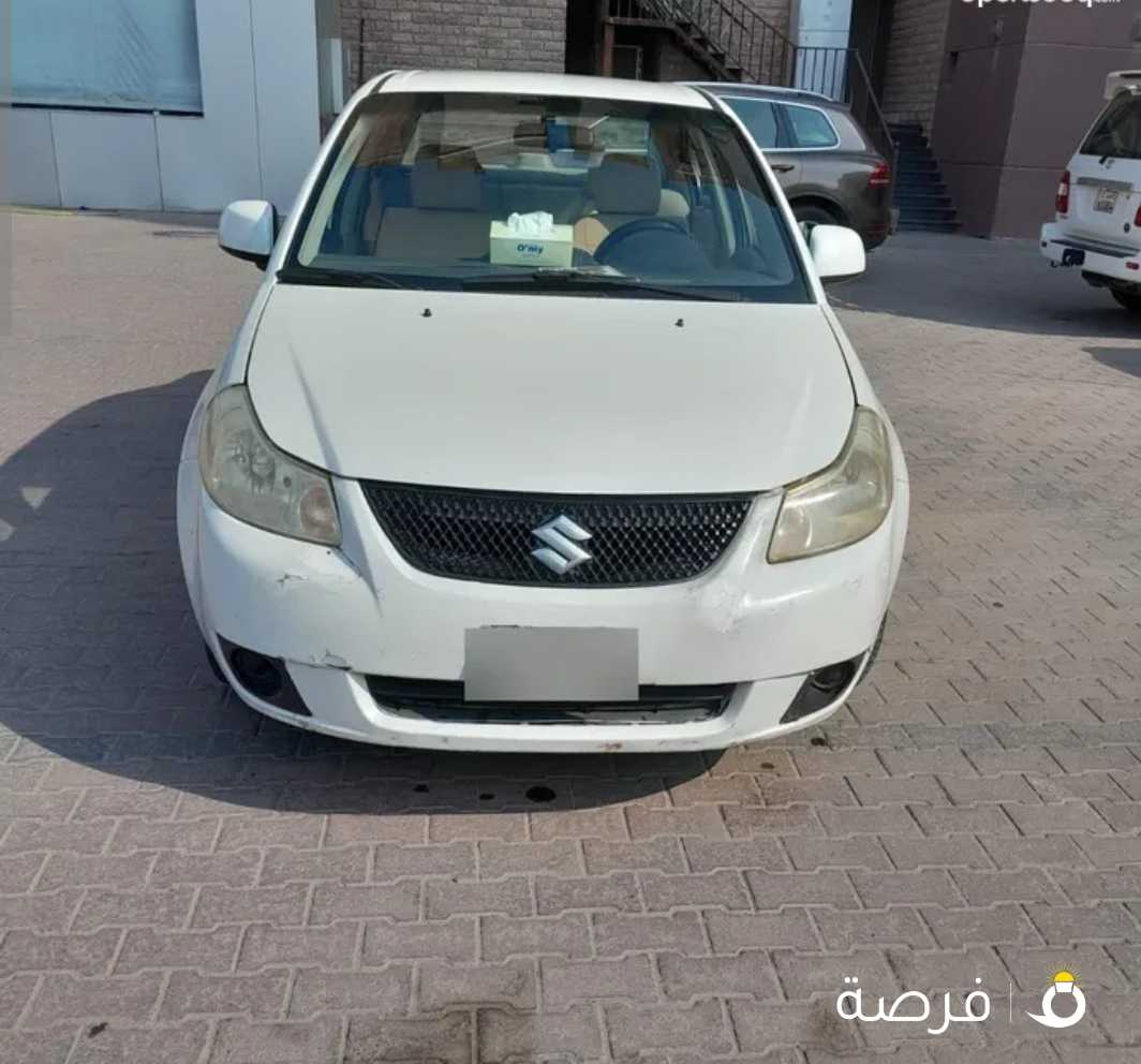 سيارة سوزوكي اكس أس فور صالون بحاله ممتازة جدا