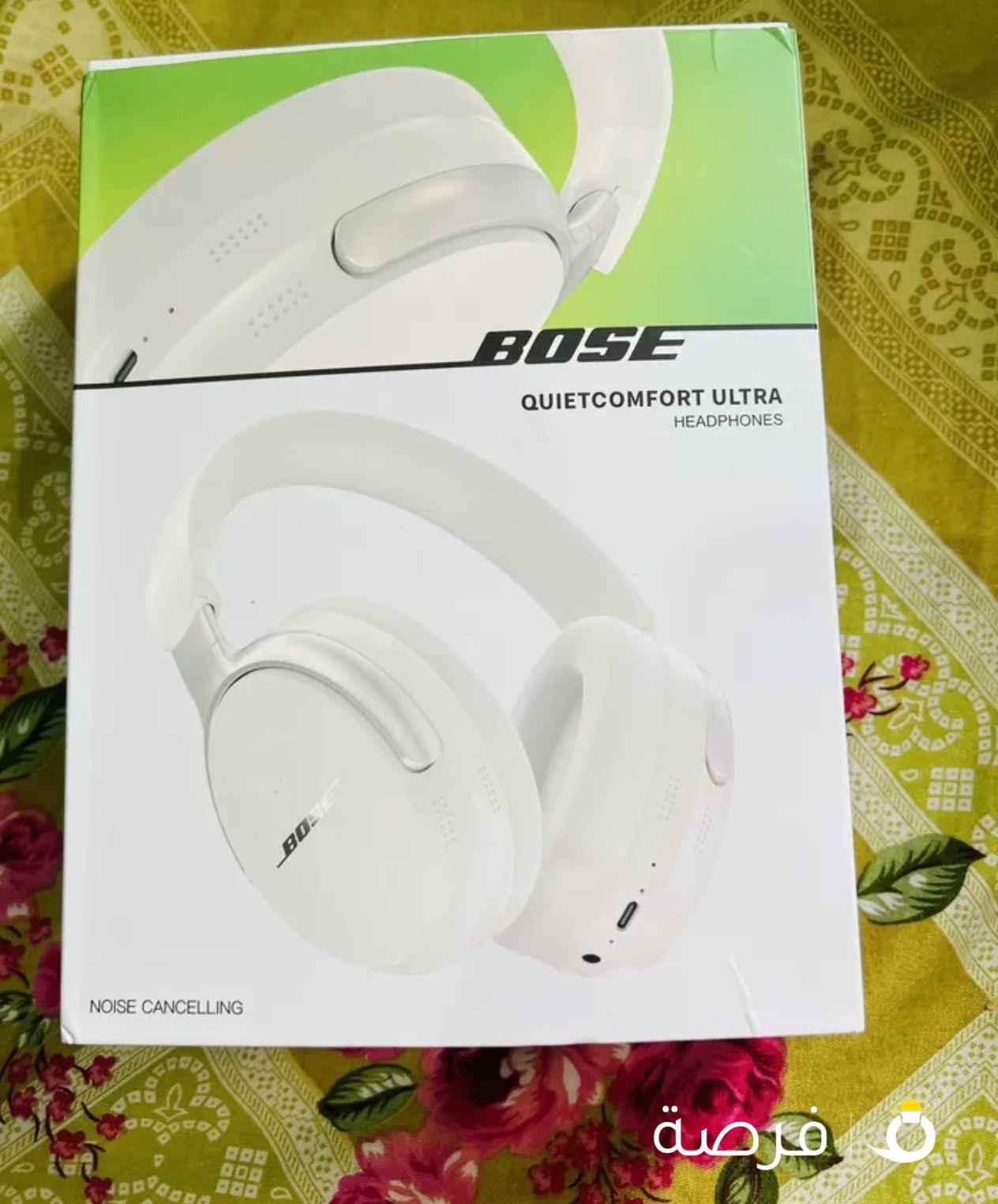Bose QuietComfort Ultra Headphones in the White Smoke color.