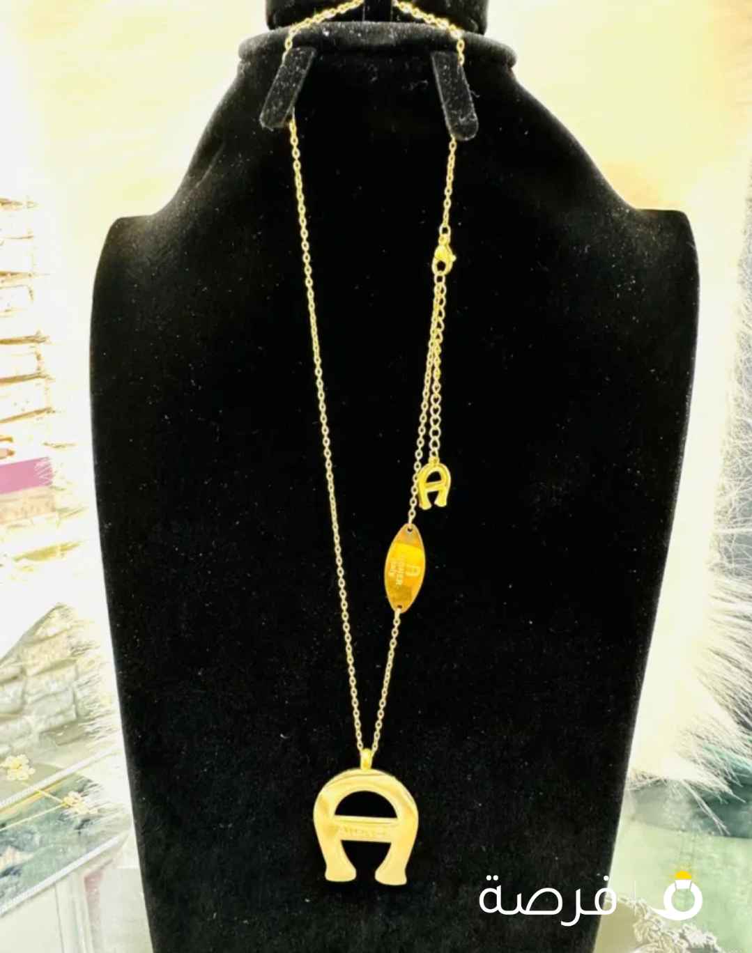 قلادة ماركة اقنر مطلي ذهب