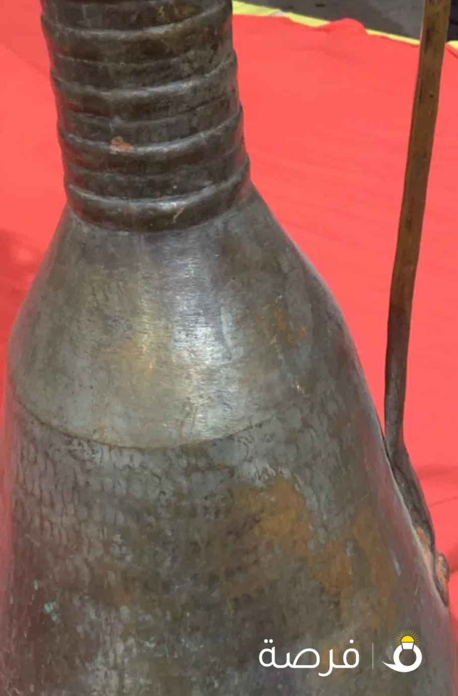 ابريق نحاس احمر