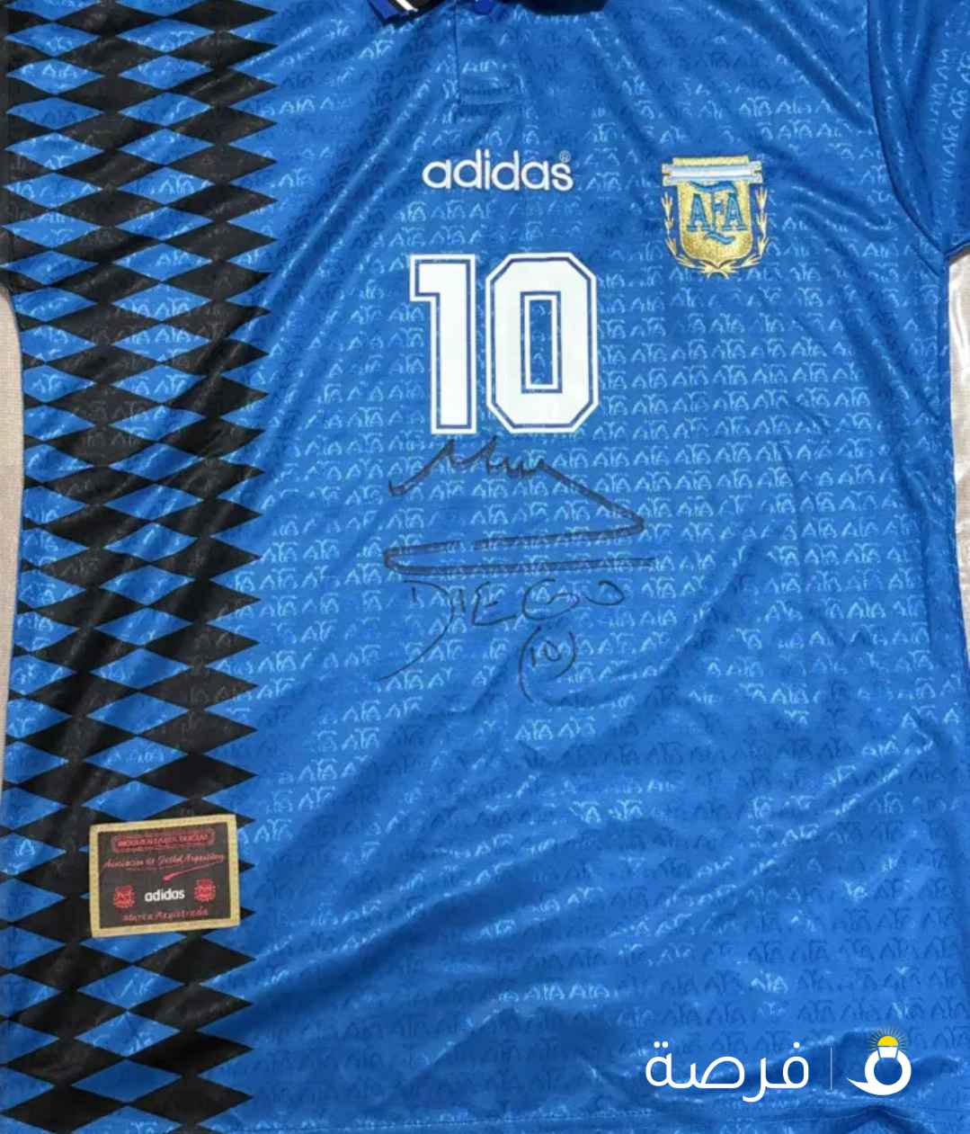 تي شيرت منتخب الأرجنتين مونديال ⁦⁦1994⁩⁩ توقيع مارادونا