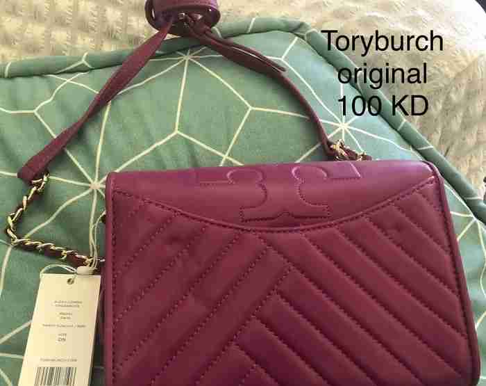 شنط يد نسائية اصليه ماركه caoch & Toryburch