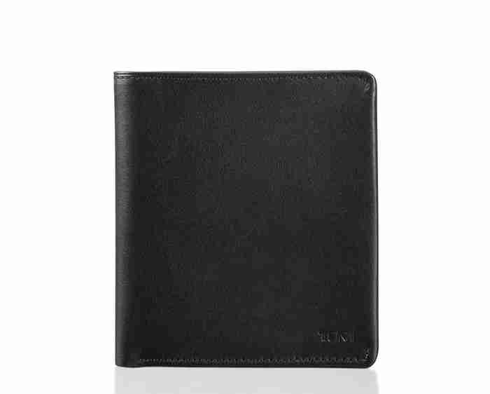 Brand new Tumi leather wallet in box!